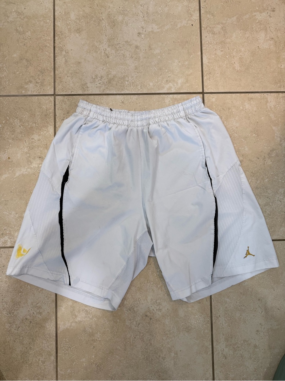 Jordan Brand White Men’s Athletic Shorts with Black Trim and Gold Jumpman